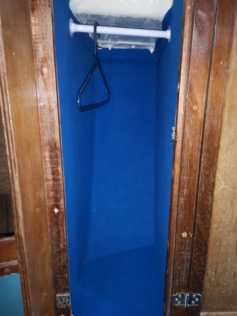 Hanging locker refurbished after partial replacement of bulkhead